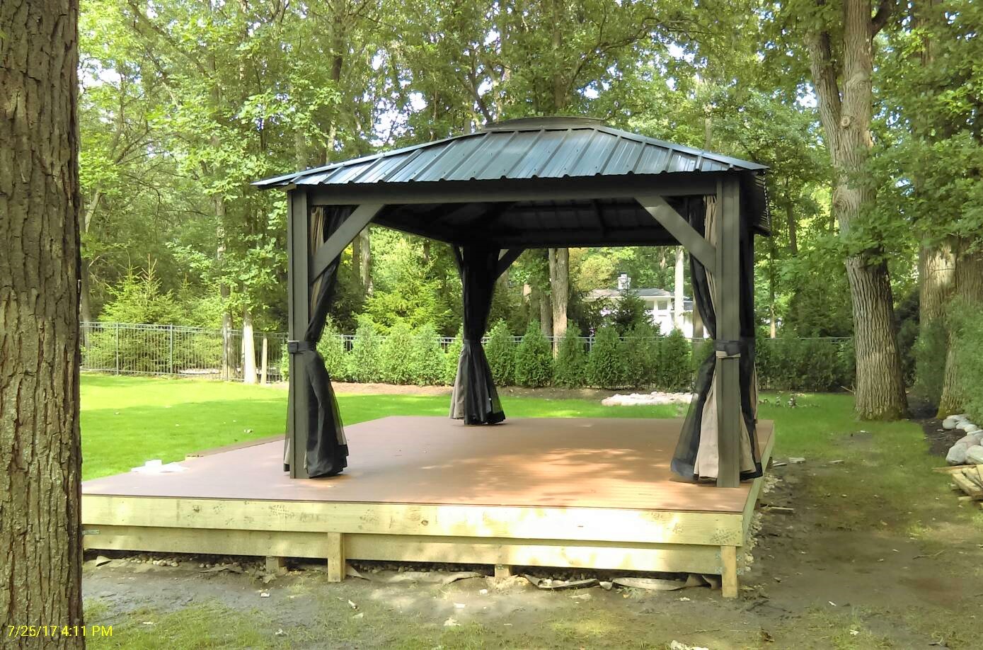 Transmotion Delivery Assembly Installation Relocation Chicago IL Visscher Verona Gazebo 11 x 14 Blacksmith (3) installation backyard outdoors