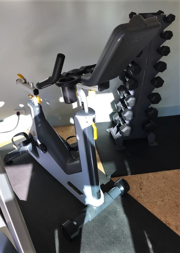 Transmotion Delivery Assembly Installation Relocation of Hoist Lemond Series UC Upright Club Bike Saint Helena CA Illinois Wisconsin Indiana Washington Michigan California Health Fitness Healthy Muscle America Fit Basement Workout Sports