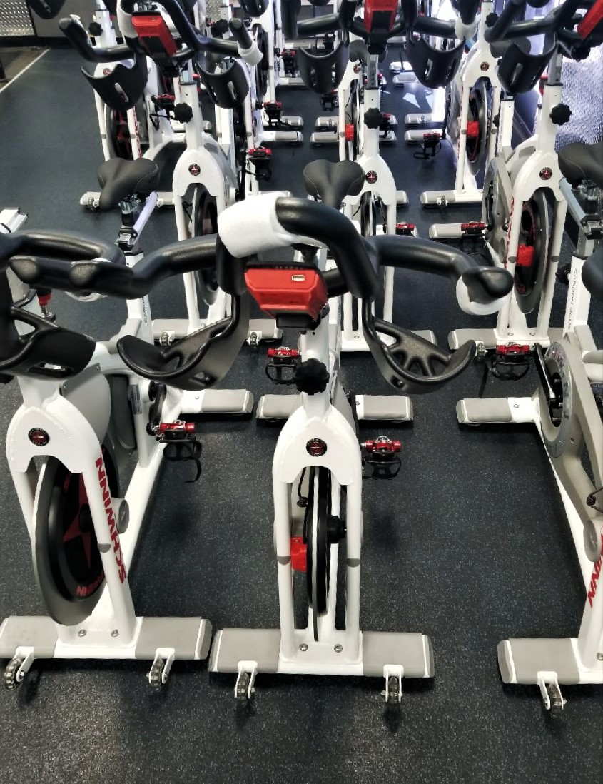 Transmotion Delivery Assembly Installation Relocation of Schwinn AC Performance Bike for Crunch Fitness in Stockton CA California Illinois Indiana Wisconsin Michigan Washington Crunch Commercial Healthy Gym Fitness Fit Muscle America