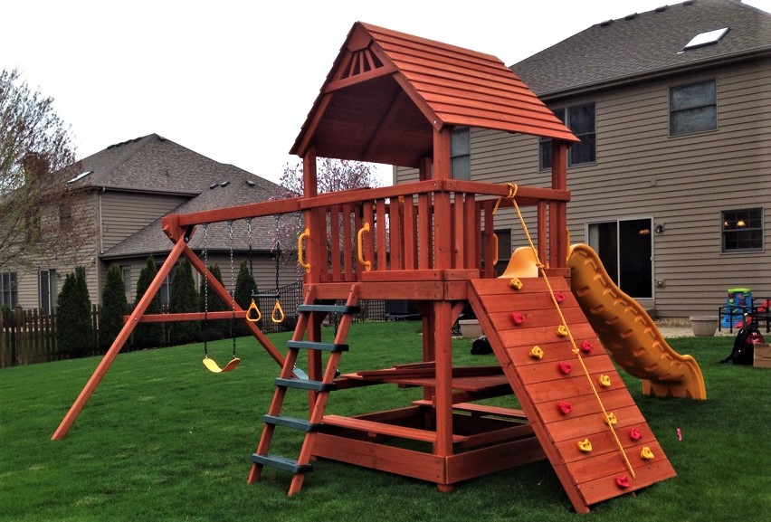 Transmotion Delivery Assembly Installation Relocation of a Escalade Sports Monkey Tower in Naperville IL Illinois Wisconsin Indiana Michigan Washington California Michigan Playset Kids Fun Backyard Summer Children Slide Swing Rope Sunny