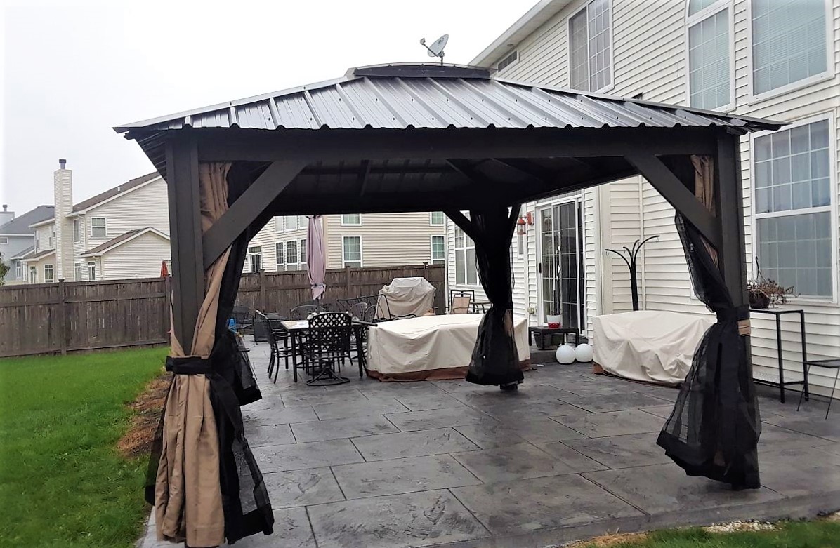 Transmotion Delivery and Installation of Visscher Verona Gazebo in Plainfield IL 11x14 Summer Illinois Wisconsin Indiana Michigan California Washington Assembly Delivery Home Backyard sun