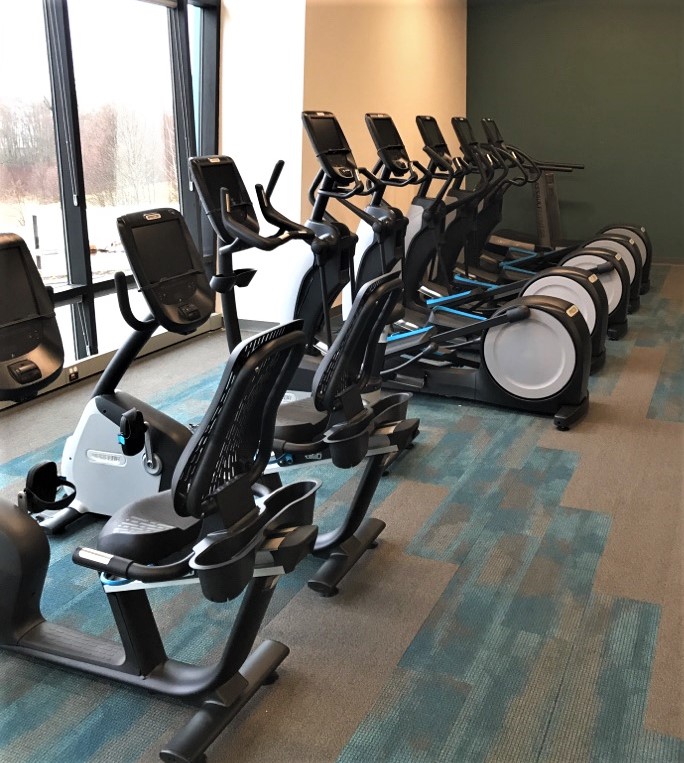 Transmotion Delivery Assembly Installation Relocation of Precor Fitness EFX885 Elliptical Fitness Cross trainer RBK885 Recumbent Bike in Mount Vernon WA Washington Wisconsin Indiana Illinois Michigan California Commercial YMCA Fit Fitness Gym Health Healthy Lifestyle