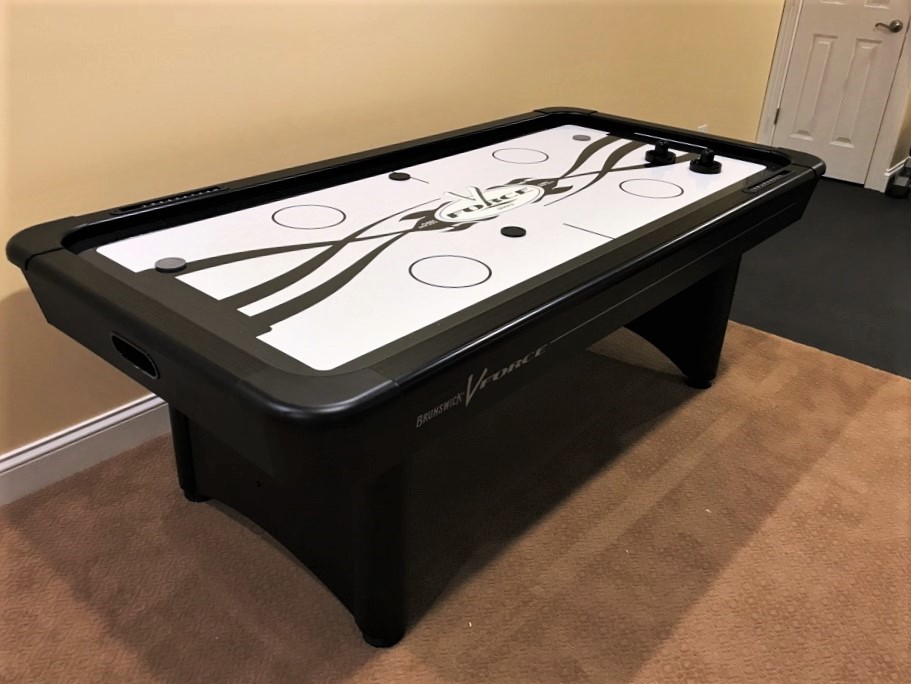 Transmotion Delivery Assembly Installation Relocation of a Brunswick Billiards 7 VForce Air Hockey Table in Vernon Hills IL Illinois Indiana Wisconsin Washington California Michigan Fun Game Friends Family Play Player America Entertainment United States
