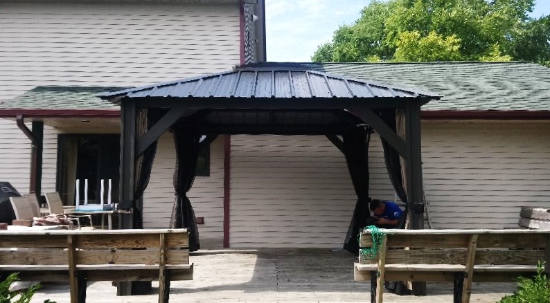 Transmotion Delivery Assembly Installation Relocation of a Visscher 11X11 Milano Gazebo in Elgin IL Illinois Indiana Michigan California Wisconsin Washington Fun Friends Family Outdoors Outside Party Lunch Dinner Summer Hot Warm Sunny Relax Modern Design America United States