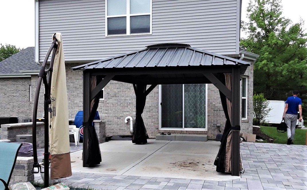 Transmotion Delivery Assembly Installation Relocation of Visscher 11X14 Verona Gazebo in New Lenox IL Illinois Indiana Wisconsin Washington Michigan California Summer Sunny Warm Weather Fun Family Friends Party Dinner Dining Lunch Modern Design Stylish America United States